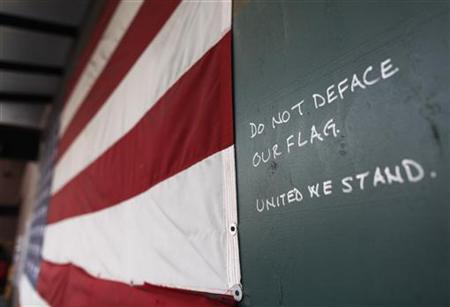 A U.S. flag honoring those who died in the World Trade Center attacks is seen in New York A U.S. flag honoring those who died in the World Trade Center attacks is seen in New York