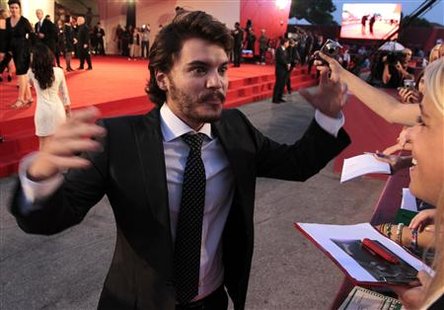 Actor Emile Hirsch reacts as greets fans during a red carpet for film "Killer Joe" at the 68th Venice Film Festival Actor Emile Hirsch reacts as greets fans during a red carpet for film "Killer Joe" at the 68th Venice Film Festival