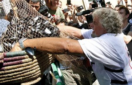 Comic and political activist Grillo dumps rotten muscle shells in front of the Parliament in Rome Comic and political activist Grillo dumps rotten muscle shells in front of the Parliament in Rome
