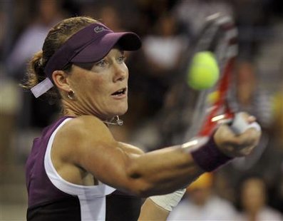 Samantha Stosur of Australia returns volley to Angelique Kerber of Germany during their semi-finals match at the U.S. Open tennis tournament Samantha Stosur of Australia returns volley to Angelique Kerber of Germany during their semi-finals match at the U.S. Open tennis tournament