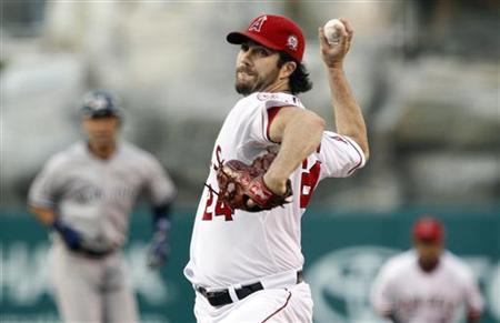 Angels starting pitcher Haren works against the Yankees during the first inning of their MLB American League baseball game in Anaheim Angels starting pitcher Haren works against the Yankees during the first inning of their MLB American League baseball game in Anaheim