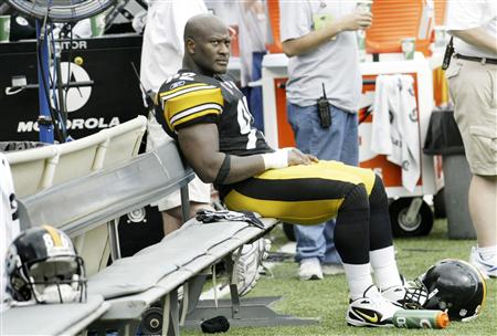 James Harrison of the Steelers sits alone on the bench during their NFL game against the Ravens in Baltimore James Harrison of the Steelers sits alone on the bench during their NFL game against the Ravens in Baltimore