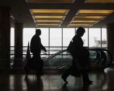 People walk through LaGuardia Airport in New York. REUTERS/Shannon Stapleton People walk through LaGuardia Airport in New York. REUTERS/Shannon Stapleton