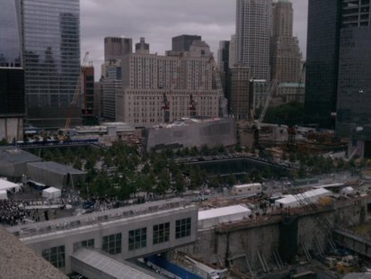 The view overlooking the new 9/11 memorial at the site of the former World Trade Center towers in New York City. The view overlooking the new 9/11 memorial at the site of the former World Trade Center towers in New York City.