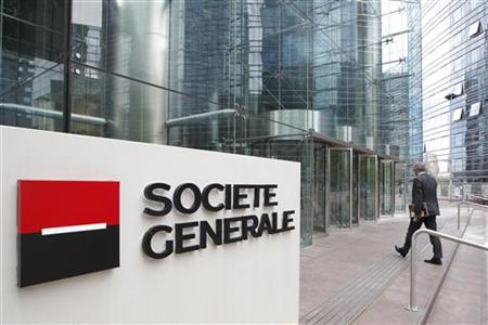 An employee enters the headquarters of French bank Societe Generale at La Defense, west of Paris An employee enters the headquarters of French bank Societe Generale at La Defense, west of Paris