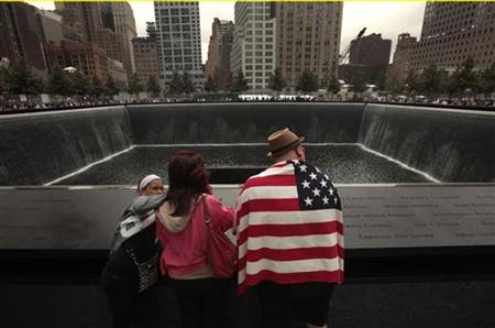 Family and friends of those who died on Sept. 11 visit the memorial in New York Family and friends of those who died on Sept. 11 visit the memorial in New York