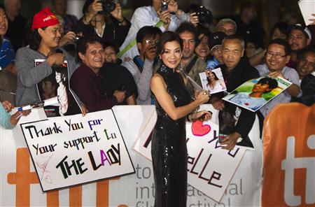 Cast member Michelle Yeoh greets fans on the red carpet for the film "The Lady" during the 36th Toronto International Film Festival Cast member Michelle Yeoh greets fans on the red carpet for the film "The Lady" during the 36th Toronto International Film Festival