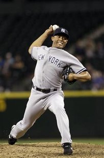 New York Yankees pitcher Mariano Rivera delivers a pitch against the Seattle Mariners during the ninth inning of their MLB American League b New York Yankees pitcher Mariano Rivera delivers a pitch against the Seattle Mariners during the ninth inning of their MLB American League b