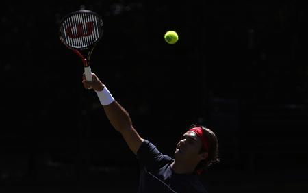 Roger Federer of Switzerland hits a ball during a practice session in Sydney Roger Federer of Switzerland hits a ball during a practice session in Sydney