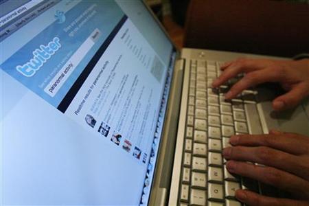 A Twitter page is displayed on a laptop computer in Los Angeles A Twitter page is displayed on a laptop computer in Los Angeles