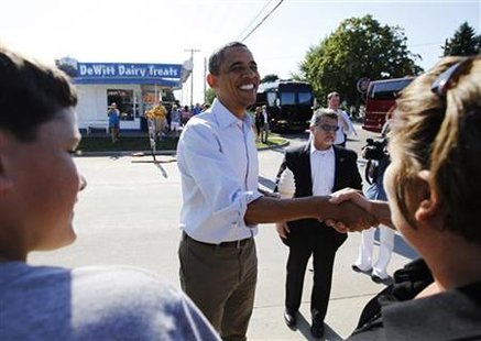 President Obama greets locals after buying ice cream during a bus tour in DeWitt, Iowa President Obama greets locals after buying ice cream during a bus tour in DeWitt, Iowa