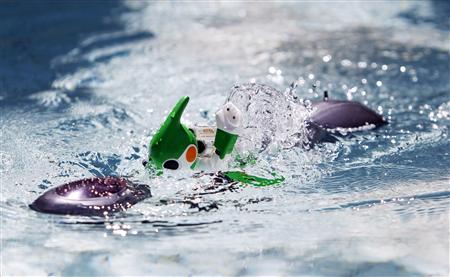 Panasonic's "Evolta" swim robot, powered by the company's Evolta rechargable batteries, is demonstrated in Tokyo Panasonic's "Evolta" swim robot, powered by the company's Evolta rechargable batteries, is demonstrated in Tokyo