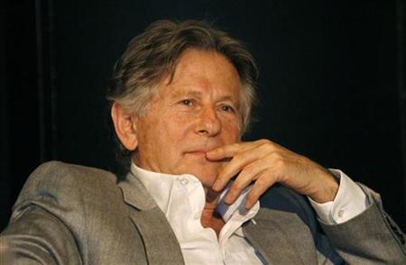 Director Polanski reacts during a news conference to present his musical 'Tanz der Vampire'in Oberhausen Director Polanski reacts during a news conference to present his musical 'Tanz der Vampire'in Oberhausen