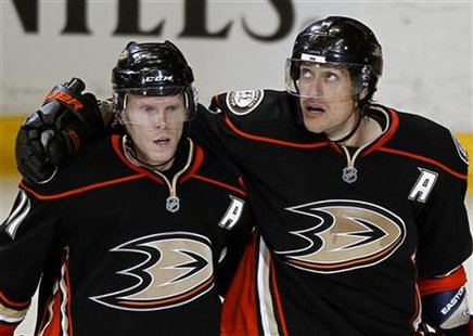 Anaheim Ducks right wing Selanne celebrates his goal against the Nashville Predators with teammate Koivu during Game 1 of the NHL Western Co Anaheim Ducks right wing Selanne celebrates his goal against the Nashville Predators with teammate Koivu during Game 1 of the NHL Western Co