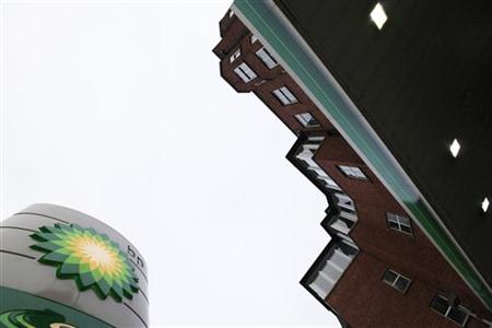 A BP logo is seen on a petrol station in London