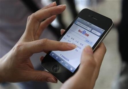 A user loads the Baidu homepage on her Apple iPhone 4 during the Baidu 2011 technology innovation conference in Beijing A user loads the Baidu homepage on her Apple iPhone 4 during the Baidu 2011 technology innovation conference in Beijing