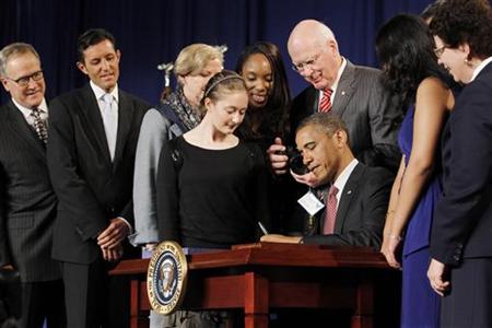U.S. President Barack Obama signs the American Invents Act at Thomas Jefferson High School in Virginia U.S. President Barack Obama signs the American Invents Act at Thomas Jefferson High School in Virginia