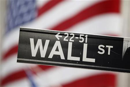A street sign stands outside of the New York Stock Exchange A street sign stands outside of the New York Stock Exchange
