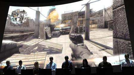 Gamers demonstrate Electronic Arts' soon to be released Medal of Honor's online multiplayer feature during their press briefing ahead of the Gamers demonstrate Electronic Arts' soon to be released Medal of Honor's online multiplayer feature during their press briefing ahead of the