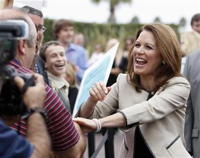 Republican presidential candidate Congresswoman Michele Bachmann greets her supporters during a rally for the Orange County Republican Party