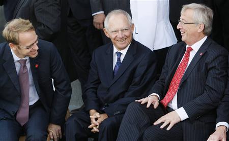 Germany Finance Minister Schaeuble talks with Eurogroup President Juncker and German central bank President Weidmann at an informal meeting Germany Finance Minister Schaeuble talks with Eurogroup President Juncker and German central bank President Weidmann at an informal meeting