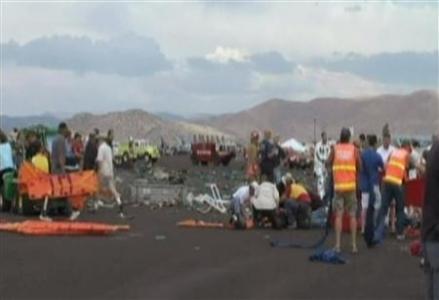 First responders and people help victims in this image taken from a video after a vintage World War Two fighter plane crashed near the grandstand at the Reno Air Races in Reno, Nevada September 16, 2011.
Credit: Reuters/KRNV-TV First responders and people help victims in this image taken from a video after a vintage World War Two fighter plane crashed near the grandstand at the Reno Air Races in Reno, Nevada September 16, 2011.
Credit: Reuters/KRNV-TV