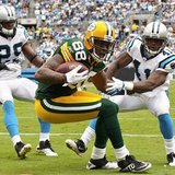 Green Bay Packers tight end Jermichael Finley catches a pass in the endzone against Carolina Panthers cornerback Captain Munnerlyn during NF Green Bay Packers tight end Jermichael Finley catches a pass in the endzone against Carolina Panthers cornerback Captain Munnerlyn during NF