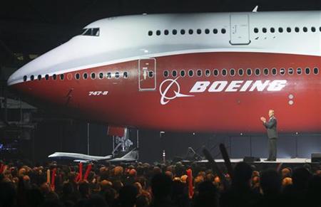 Pat Shanahan speaks to employees and guests after a curtain was raised to unveil the 747-8 jumbo passenger jet at the company's Everett, Was Pat Shanahan speaks to employees and guests after a curtain was raised to unveil the 747-8 jumbo passenger jet at the company's Everett, Was