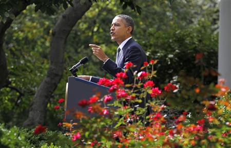 President Obama gestures as he talks about cutting the U.S. deficit by raising taxes in Washington President Obama gestures as he talks about cutting the U.S. deficit by raising taxes in Washington