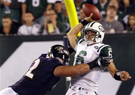 Jets' Sanchez hit as he attempts throw against Ravens in second half in their NFL football game in East Rutherford Jets' Sanchez hit as he attempts throw against Ravens in second half in their NFL football game in East Rutherford