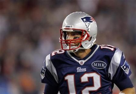 New England Patriots quarterback Tom Brady reacts after the Patriots scored a touchdown against the San Diego Chargers in the fourth quarter New England Patriots quarterback Tom Brady reacts after the Patriots scored a touchdown against the San Diego Chargers in the fourth quarter