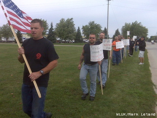 Union workers at Oshkosh Corporation are holding an informational picket at the company's three Oshkosh facilities, Tuesday, September 20, 2011. (courtesy of FOX 11). Union workers at Oshkosh Corporation are holding an informational picket at the company's three Oshkosh facilities, Tuesday, September 20, 2011. (courtesy of FOX 11).