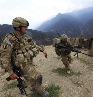 U.S. Army soldiers from Alpha Company 2nd battalion 27th infantry (the Wolfhounds), Task Force No Fear climb upon arrival to Observation Pos U.S. Army soldiers from Alpha Company 2nd battalion 27th infantry (the Wolfhounds), Task Force No Fear climb upon arrival to Observation Pos