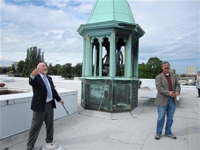 Tacoma schools superintendent Jarvis and School Board President Miller ring the ceremonial bell on top of the Tacoma Central School District Tacoma schools superintendent Jarvis and School Board President Miller ring the ceremonial bell on top of the Tacoma Central School District