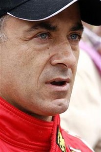 France's Ferrari F430 driver Jean Alesi is seen before the Le Mans 24 Hours sportscar race in Le Mans France's Ferrari F430 driver Jean Alesi is seen before the Le Mans 24 Hours sportscar race in Le Mans
