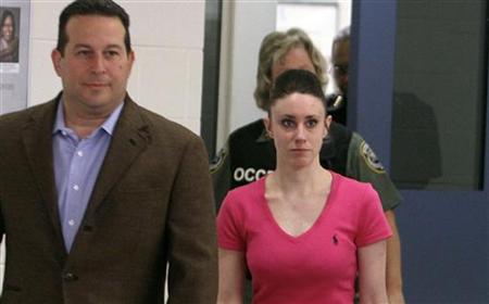 Casey Anthony and her lawyer Jose Baez leave the Orange County Jail in Orlando