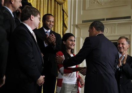 President Barack Obama greets Keiry Herrera at a No Child Left Behind event in Washington President Barack Obama greets Keiry Herrera at a No Child Left Behind event in Washington