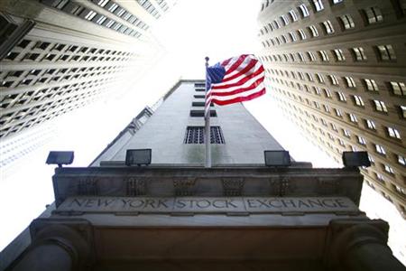 A flag flutters outside New York Stock Exchange A flag flutters outside New York Stock Exchange
