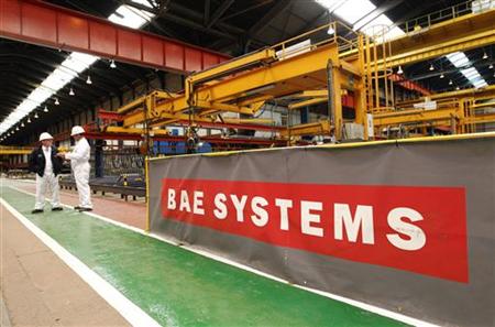 Workmen stand in the BAE Systems' Govan shipyard in Glasgow, Scotland Workmen stand in the BAE Systems' Govan shipyard in Glasgow, Scotland