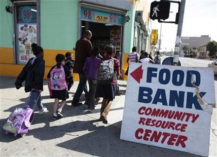 Regional coordinator Charles Evans picks up children from school to take them to an after-school program at South Los Angeles Learning Cente Regional coordinator Charles Evans picks up children from school to take them to an after-school program at South Los Angeles Learning Cente