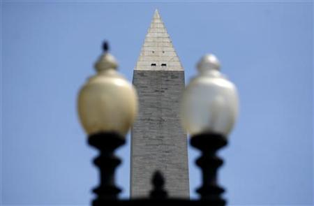 The west-facing side of the Washington Monument is photographed the day after an earthquake shook the east coast The west-facing side of the Washington Monument is photographed the day after an earthquake shook the east coast