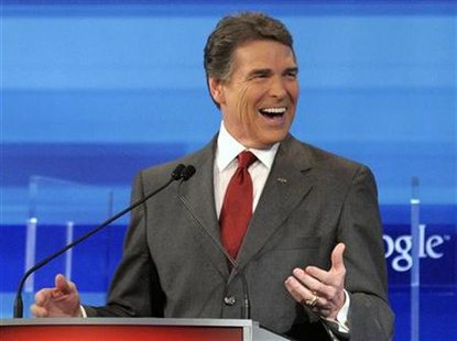 Texas Governor Perry speaks during the Republican Party of Florida presidential candidates debate in Orlando Texas Governor Perry speaks during the Republican Party of Florida presidential candidates debate in Orlando