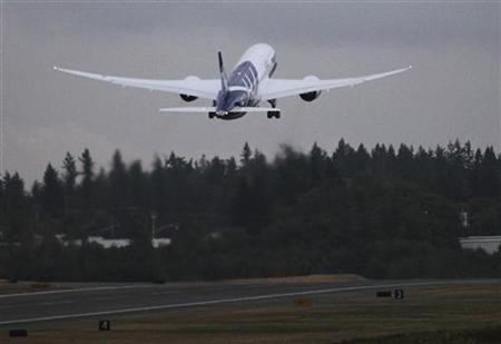 Boeing 787 Dreamliner takesoff on departure from Paine Field in Everett, Washington for delivery to first customer All Nippon Airways of Jap Boeing 787 Dreamliner takesoff on departure from Paine Field in Everett, Washington for delivery to first customer All Nippon Airways of Jap