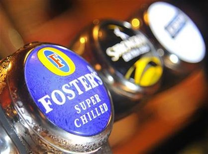 A Foster's logo is seen on a beer pump at an Australian themed bar in west London A Foster's logo is seen on a beer pump at an Australian themed bar in west London