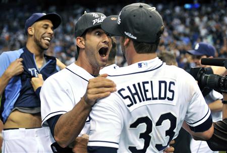 Rays' Ruggiano celebrates with teammates Price and Shields after their team defeated the Yankees in their American League MLB baseball game Rays' Ruggiano celebrates with teammates Price and Shields after their team defeated the Yankees in their American League MLB baseball game