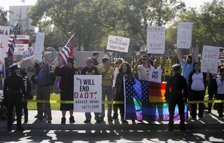 Protesters line the motorcade route of U.S. President Obama before a fundraiser in Los Angeles Protesters line the motorcade route of U.S. President Obama before a fundraiser in Los Angeles