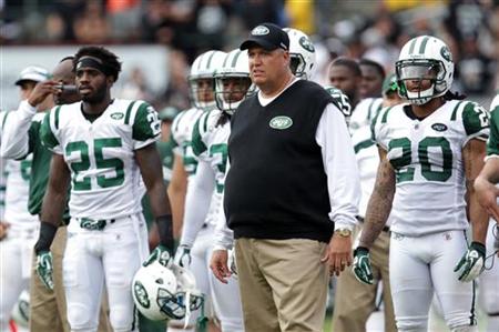 New York Jets head coach Rex Ryan watches his team play the Oakland Raiders in Oakland New York Jets head coach Rex Ryan watches his team play the Oakland Raiders in Oakland