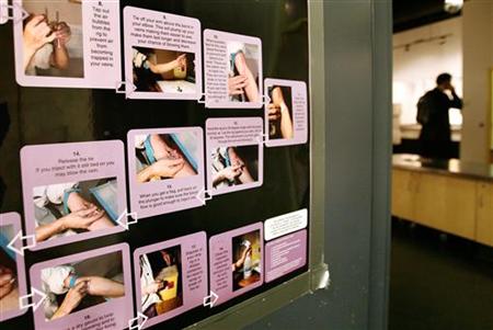 A poster shows how to use a syringe safely inside a safe injection site for drug addicts on Vancouver, British Columbia's eastside A poster shows how to use a syringe safely inside a safe injection site for drug addicts on Vancouver, British Columbia's eastside