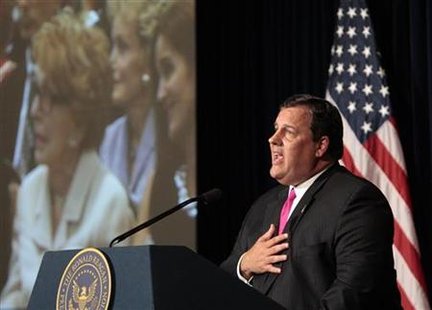New Jersey Governor Christie speaks as a screen shows former first lady Nancy Reagan looking on, at the Ronald Reagan Presidential Library a New Jersey Governor Christie speaks as a screen shows former first lady Nancy Reagan looking on, at the Ronald Reagan Presidential Library a