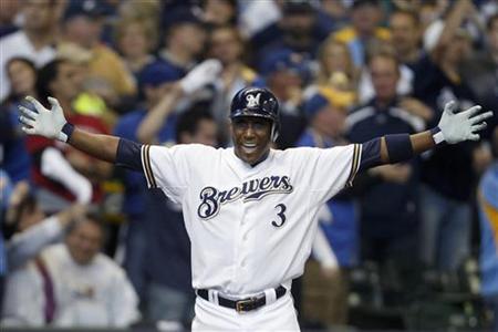 Betancourt celebrates his 6th inning triple against the Diamonbacks during their MLB National League Divisional League Series baseball playo Betancourt celebrates his 6th inning triple against the Diamonbacks during their MLB National League Divisional League Series baseball playo